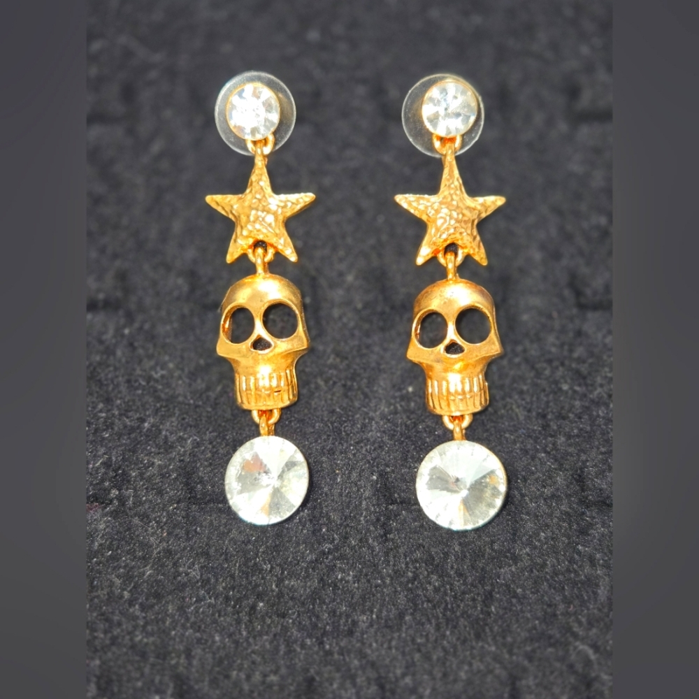 GOLD-TONE SKULL AND STAR EARRINGS WITH RHINESTONES